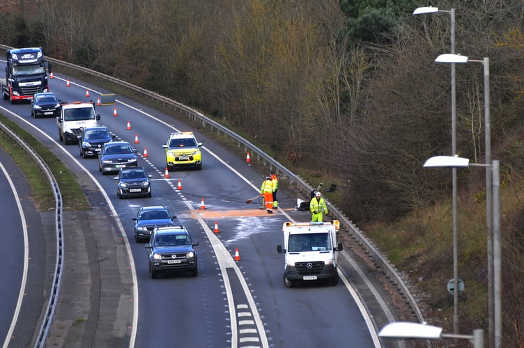 Photo: Steve Pope MDA040322A_SP001
Highways staff clearing the A30 east-bound carriageway following this morning’s collision between a tractor and a lorry