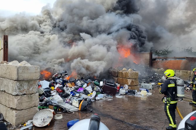 Firefighters tackle the blaze at the Marsh Barton recycling centre