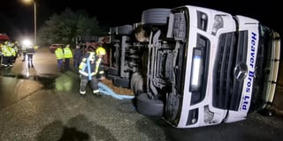 Firefighters battle to protect environment as HGV overturns