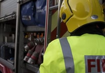 Combine harvester catches fire