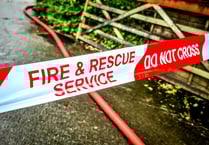 Firefighters battle blaze in combine harvester