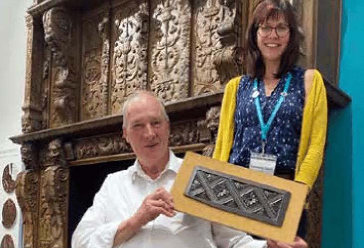 David Weeks and Dr Charlotte Dixon with the screen and its missing
section