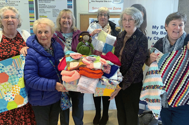 Newton Abbot WI members with some of their handiwork.