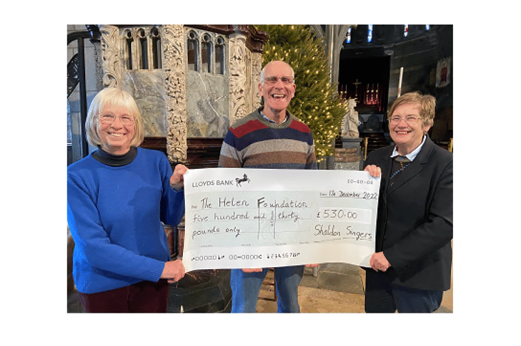 Shaldon Singers present the Helen Foundation with a cheque