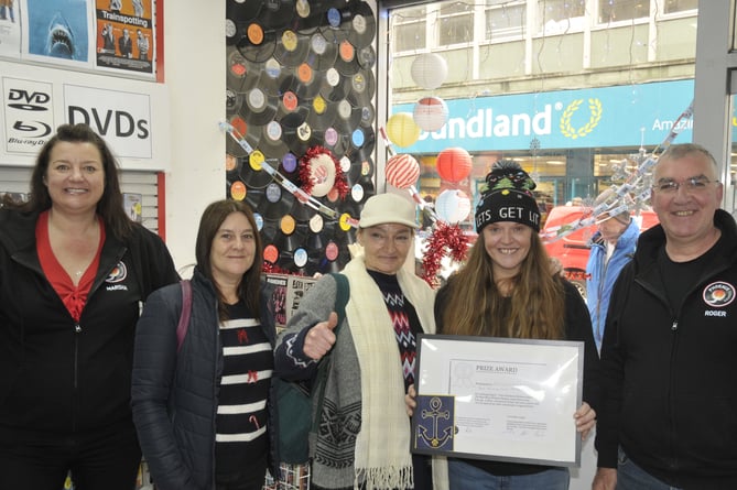 Phoenix Sound placed first in the Heritage Party's Christmas Window Competition