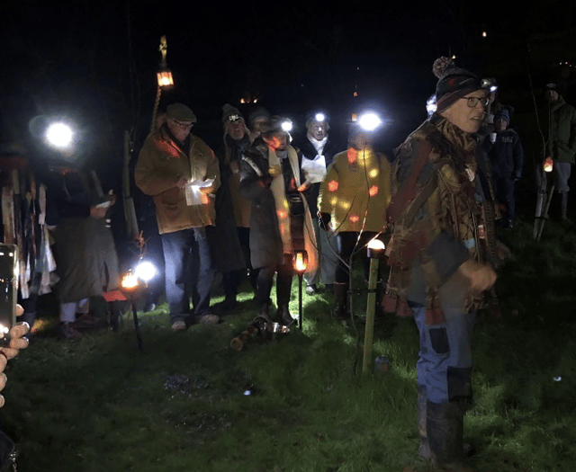 Wassailing warms up a chilly night in Holcombe