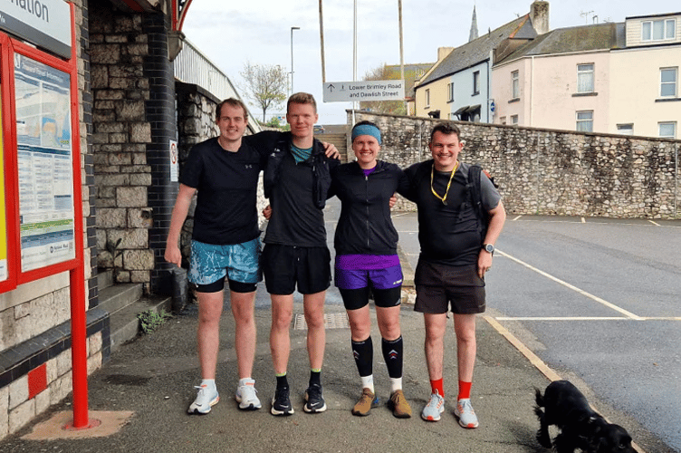 Firefighters Josh Boyne, Luke Margrie and Shannon Tomlinson ran their 26.2 miles from Teignmouth to Exmouth in an equally impressive 4hrs 42mins!