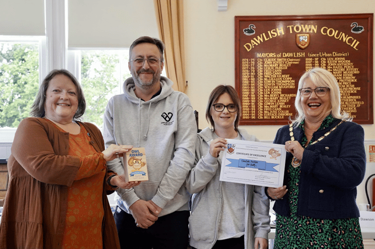 Dawlish Action for Youth representatives receive their Owl Award.