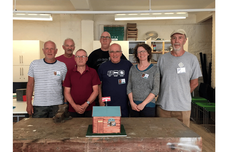 The Community Shed team, from left, Kevin, Gary, Graham, Tim, Peter, Emily and Albert.