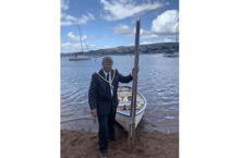 Rowing across the Teign... all in a days work for council Chairman
