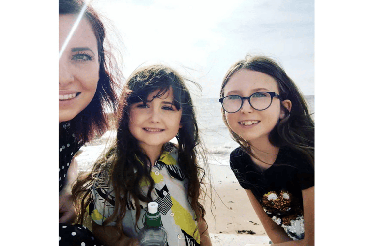 Mum Kerry Phillips with daughters Autumn-Rayne and Tallula-Kiwi