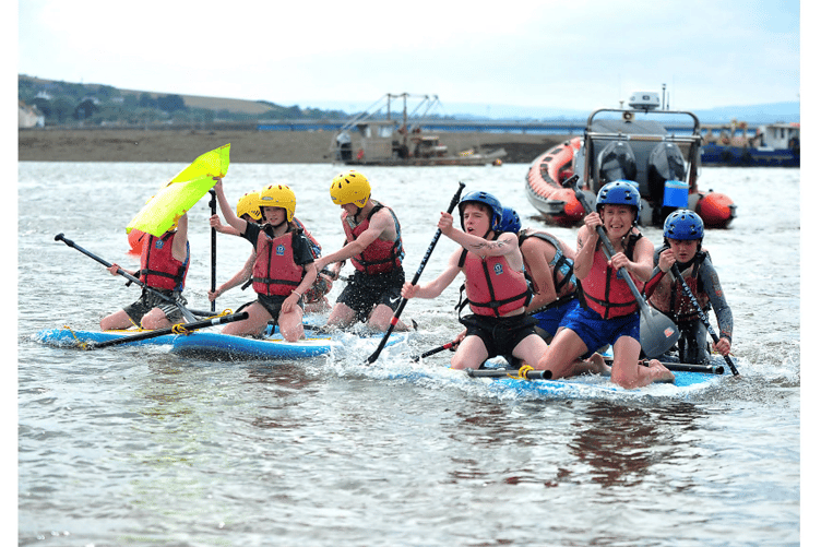 Competitors in the junior raft race event at Teignmouth Regatta