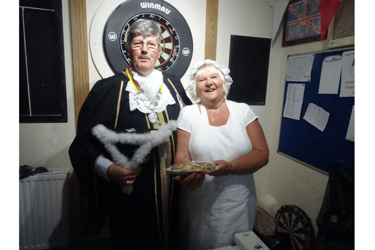 Portreeve Allan Vizor and bread weigher Sue Joyce.