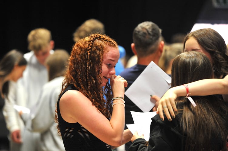 GCSE results day at Teign School in Kingsteignton. Tears of joy from Alex McCarthy-Mason as she opens the all-important envelope. 'They were better I expected and it's a releif that it's all done now,' she said.