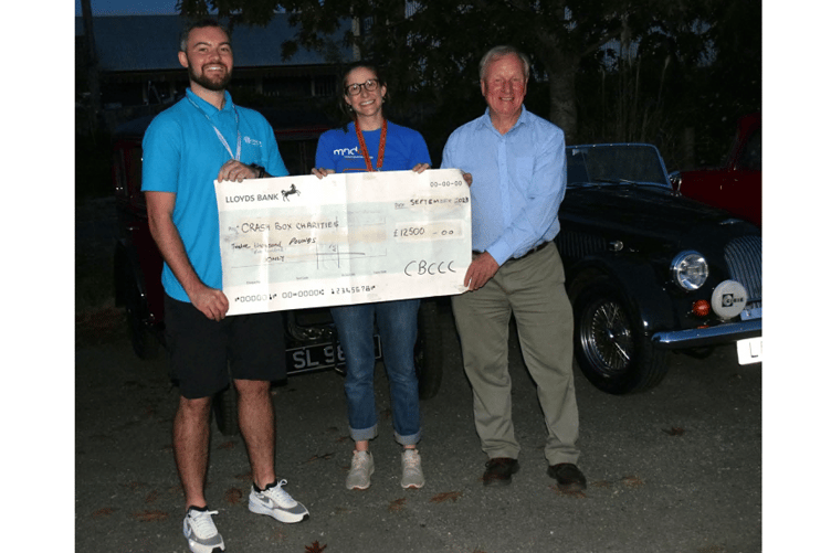 Jake Cawthorne from Hospiscare (Exeter), Helen Macke from the Motor Neurone Disease Association Torbay Group, and Mike Overfield Collins , President of the Crash Box and Classic Car Club