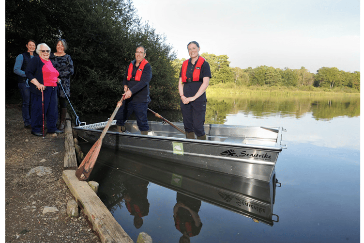 Friends of Stover Country Park Trustees Maryann Soper, Daphne Watts and Emily Farrell with rangers Robert Ballard and Delyth Poole.