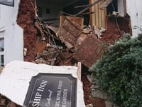 Wall collapses at popular pub 