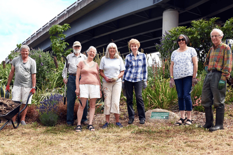 The CIC volunteer gardening team working at Penn
Inn roundabout