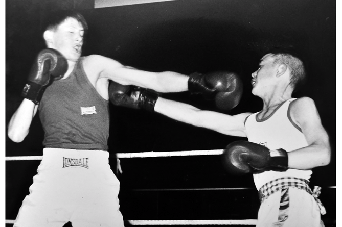 Boxing competion at Dyrons in Newton Abbot from December 1990. Luke Whane from Newton Abbot taking on Devonport’s S Aubert