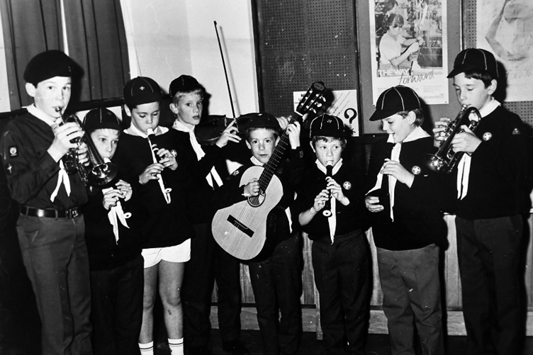 Pictured above are the group after having received commemorative badges, while below a musical line up comprising Jonathan Laird, Adam Robins, James Henderson, Christhoper Collings, Ian Humphrey, Michael Heath  and Ian Langly prepare for a musical interlude at the event