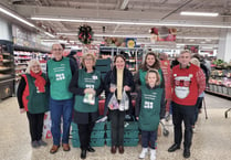 MP helps Tesco food drive for those in need