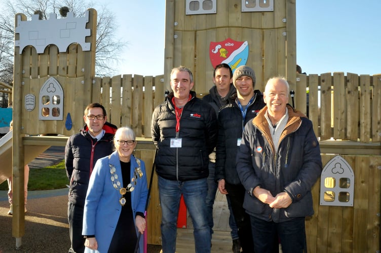 Bovey Tracey Town Clerk, Mark Wells, mayor of Bovey Tracey, Cllr Sheila Brooke, with representatives from Eibe Play Ltd