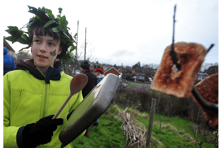 Eleanor Maynard making a noise to force out any unwanted spirits from the trees.