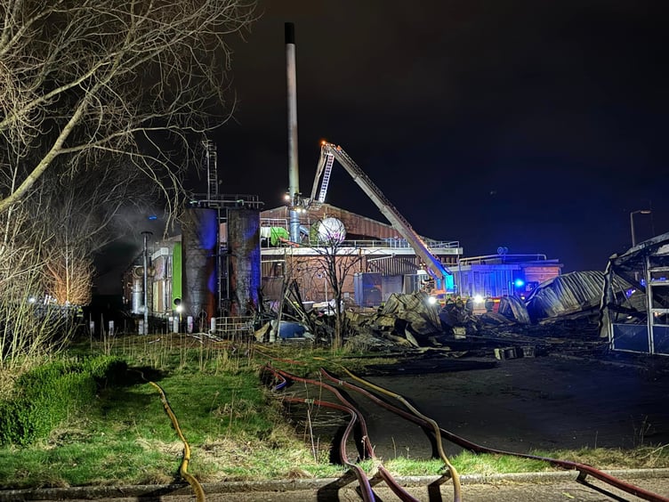 Fire crews at the scene of last night's fire at a derelict commercial property in Exeter Photo:DanesCastleFireStation