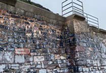 Storm damage to sea wall repaired