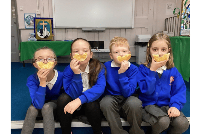 Children at All Saints Marsh enjoy their bagels thanks to a grant from Tesco