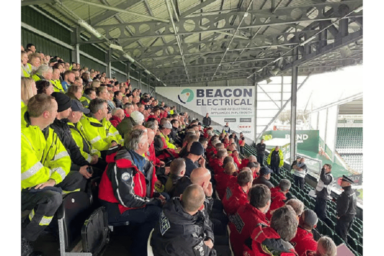Volunteers are briefed at Plymouth Argyle’s Home Park stadium.