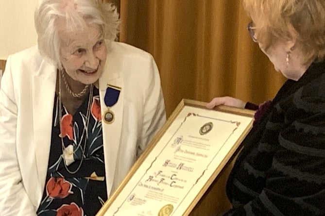 Sylvia Russell being awarded the Freedom of the Town