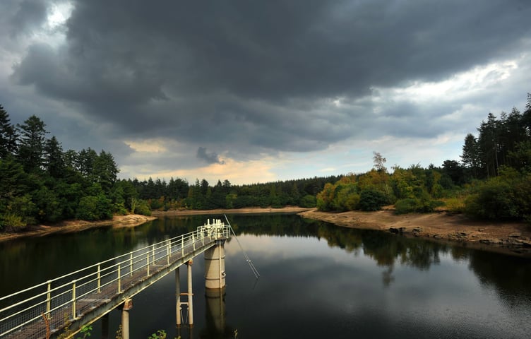 Photo: Steve Pope MDA150822A_SP002
Summer drought 2022. Storm clouds gather over Tottiford Reservoir in the Teign Vally but it will need many months of rain to replenish the reservoir that is currently at 46% capacity