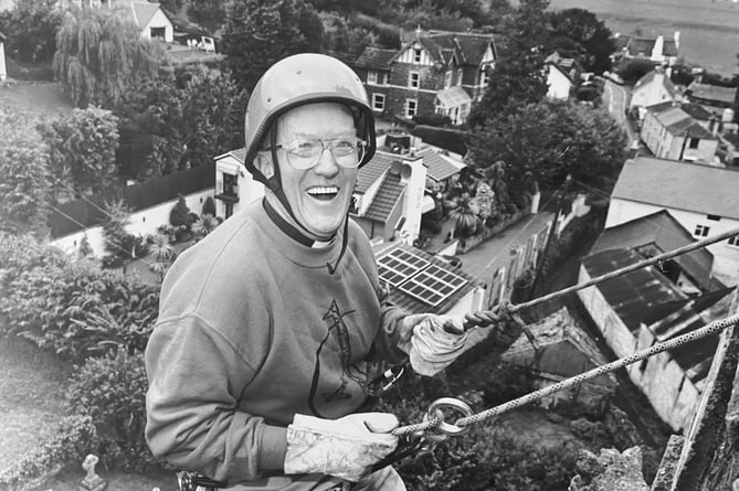 October 1995. Abseiling vicar Bob Southwood on top of the world at Combeinteignhead Church