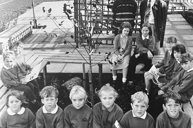 October 1995. Opening of a new Quiet Area for pupils at Gatehouse Primary School in Dawlish. Classroom assistant Glen Taylor and Paul Martin from sponsors SWEB with pupils in the new area 