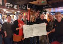 Charities benefit from pub quizzers 
