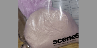 Two arrested after police seize suspected heroin 