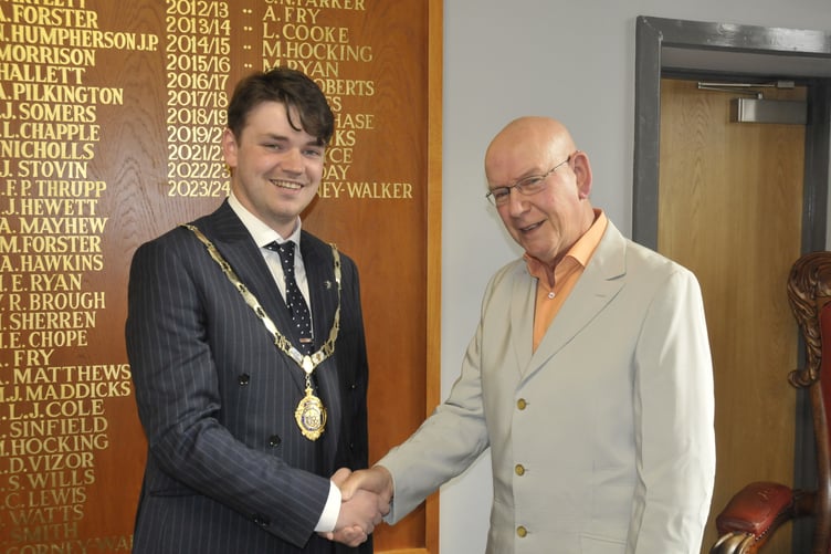 Newton Abbot's new mayor, Cllr Alex Hall, with previous incumbent, Cllr David Corney-Walker