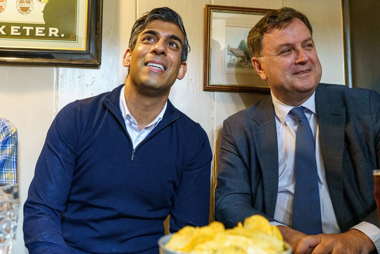 Prime Minister Rishi Sunak popped into the Drewe Arms Community Pub at Drewsteignton for a pint of pop.
The PM, a teetotaller, was visiting the pub  which has been taken into community ownership, with  Work and Pensions Secretary Mel Stride as he hit the election trail in Devon.