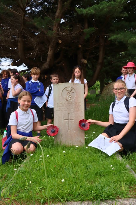 Children from Teignmouth Primary School honour war dead