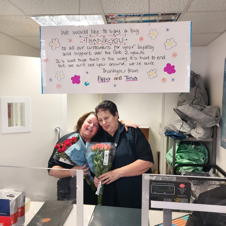 Sad farewell to staff at Dawlish Post Office counter. Photo Gordon Richards