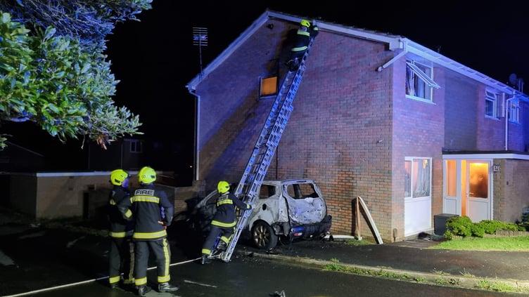 Firefighters from Newton Abbot tackle car fire. Photo Newton Abbot Fire Station