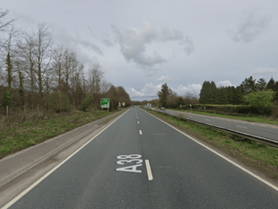 Broken down vehicle on A38 causing long delays 