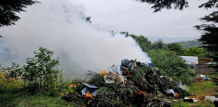 Fire crew tackles large waste pile fire 