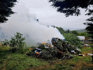 Fire crew tackles large waste pile fire 