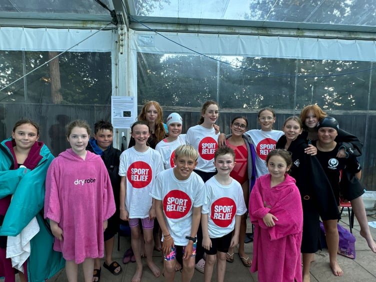 Dawlish Swimming Club take on sponsored swim