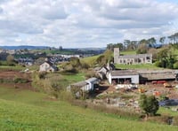 Road plans to controversial development narrowly approved 