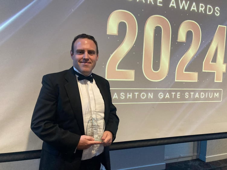 Andy Hood receives his award.