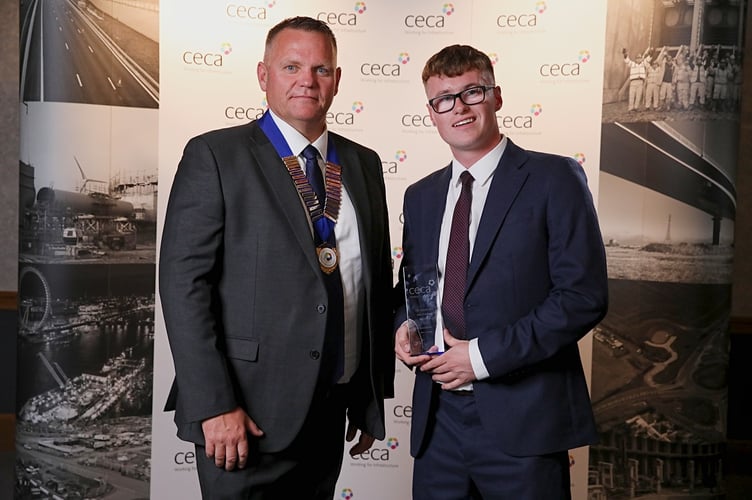 Max James receiving his Young Achiever Award from Phil Ramsden, Chair, CECA South West.

