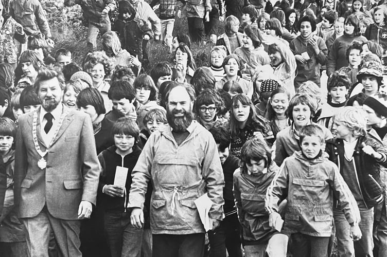 Sydney Williams leads the Christian Aid charity walk off at Newton Abbot Racecourse in May 1978